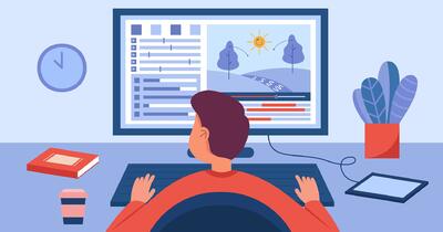 Людина працює за комп’ютером фріланс